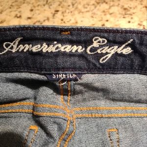 Ladies American Eagle skinny blue jeans 14 stretch